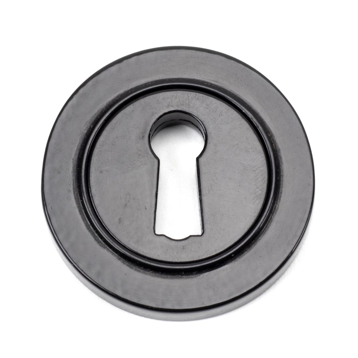 From The Anvil Round Escutcheon