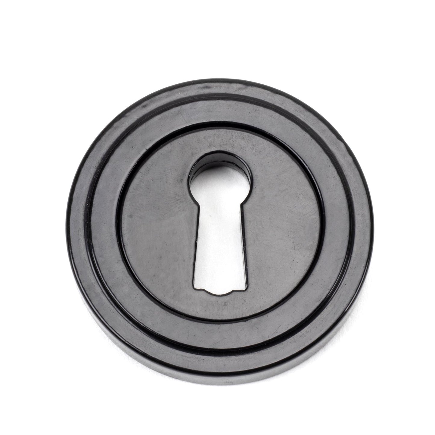 From The Anvil Round Escutcheon