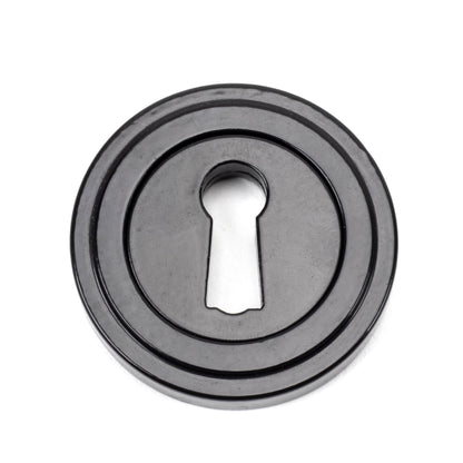 From The Anvil Round Escutcheon