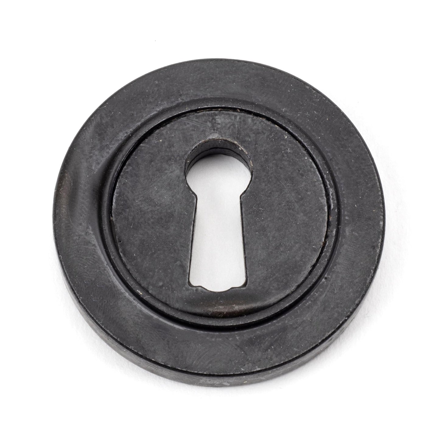 From The Anvil Round Escutcheon
