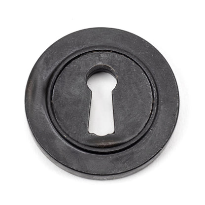 From The Anvil Round Escutcheon