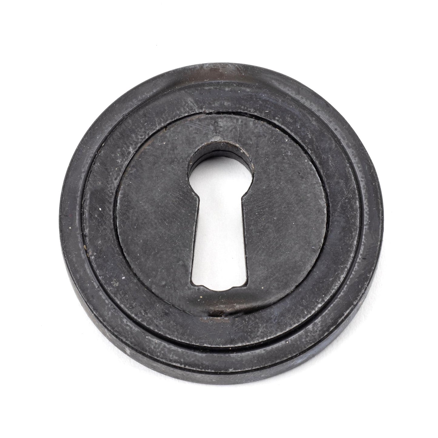 From The Anvil Round Escutcheon