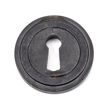 From The Anvil Round Escutcheon