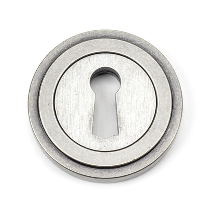 From The Anvil Round Escutcheon