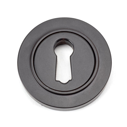 From The Anvil Round Escutcheon