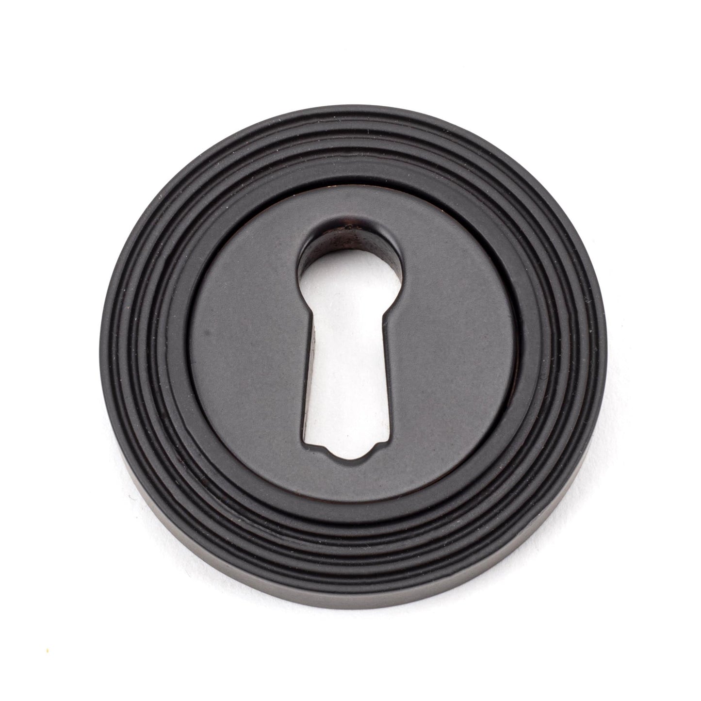 From The Anvil Round Escutcheon